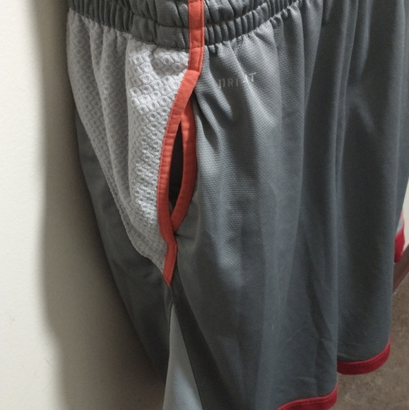 (L) Grey with Red Trim Nike Basketball Shorts - Picture 5 of 12